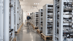 Interior of a data center with server racks representing energy and water efficiency through advanced data center water treatment.