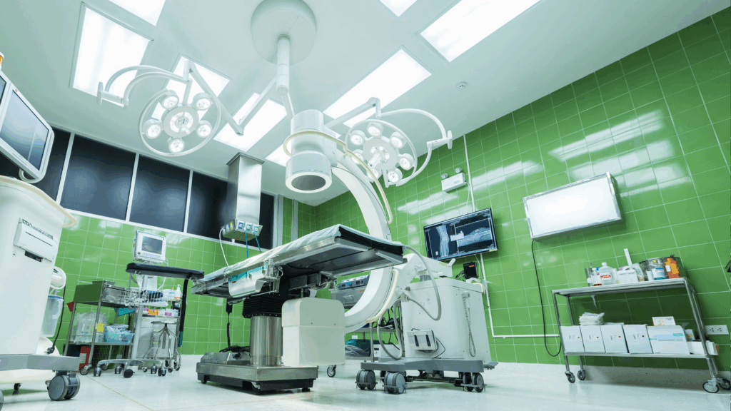 Modern hospital operating room with medical equipment, illustrating the critical role of healthcare secondary disinfection in protecting patient environments.