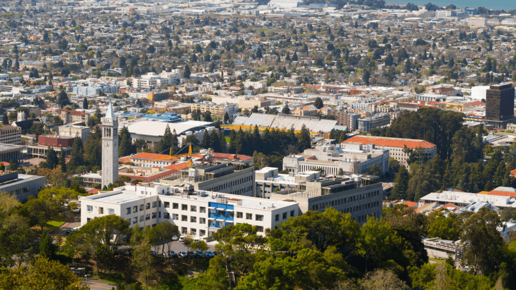 Aerial view of a university campus with dorms and recreational facilities, highlighting the need for Legionella management.