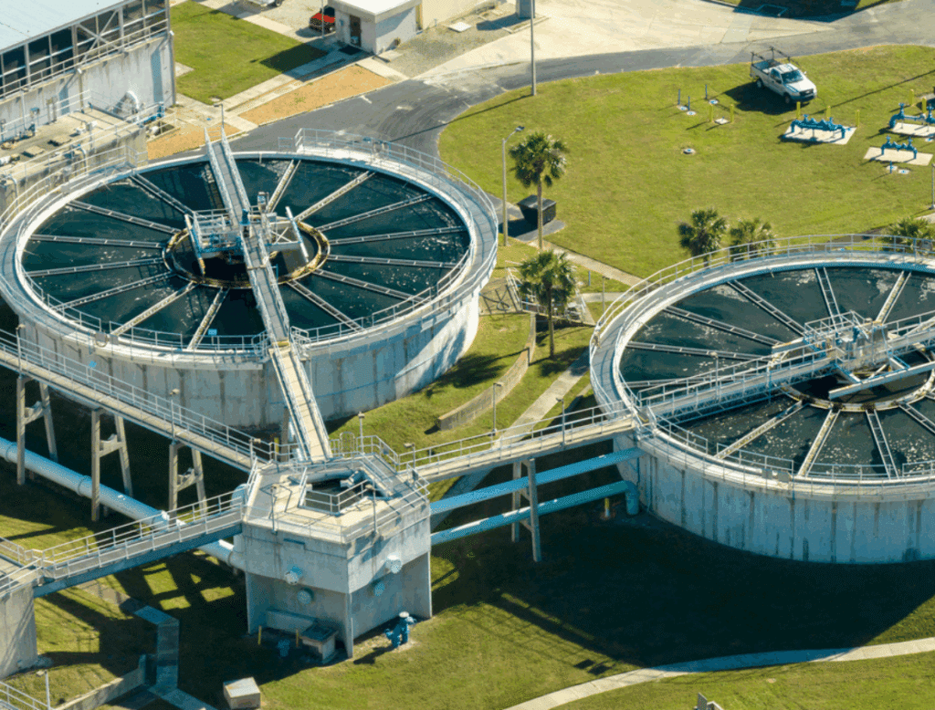 Industrial water treatment plant with circular clarifier tanks used for sedimentation and wastewater treatment processes